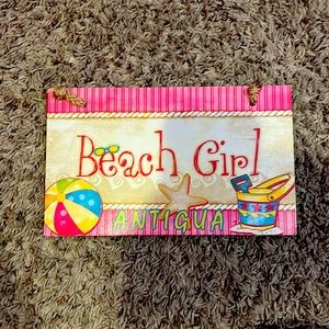 Beach girl decorative sign from Antigua
